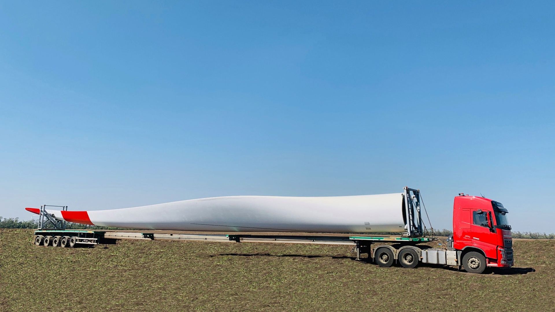 transporting blades for a wind farm